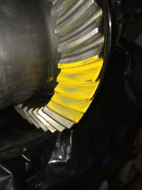 1996 Ford Bronco - Close-up of a differential gear with yellow markings on its teeth.