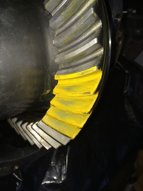 1996 Ford Bronco - Close-up of a differential gear showing yellow marking compound on the teeth.