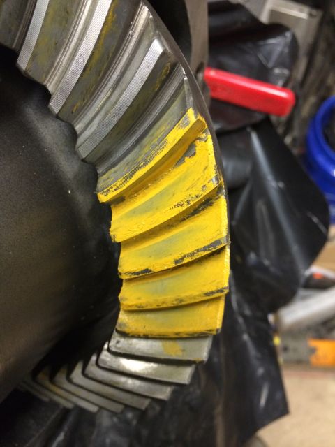 1996 Ford Bronco - Differential gear with yellow paint on its teeth, likely for marking purposes.