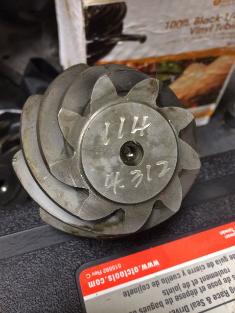 1996 Ford Bronco - Close-up of a differential gear, showing etched numerical markings.