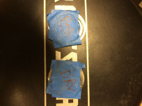 1996 Ford Bronco - Two parts marked with blue tape and red writing.