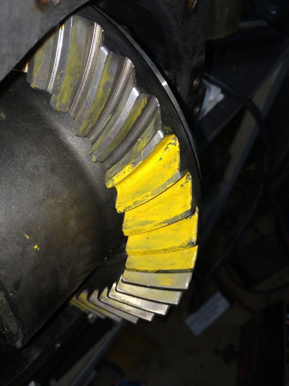 Differential gear with yellow paint markings on teeth