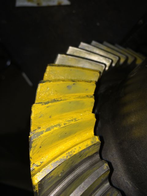 1996 Ford Bronco - Differential gear teeth showing contact pattern with yellow paint.
