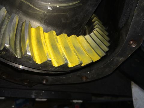 1996 Ford Bronco - Close-up of a differential gear with yellow markings, likely indicating wear pattern or setup.