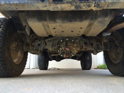 1996 Ford Bronco - Underside view of a truck's rear axle, showing the differential and suspension components.