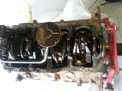 1994 Ford Bronco - Engine block with internal components and oil filter. The block appears to be disassembled.