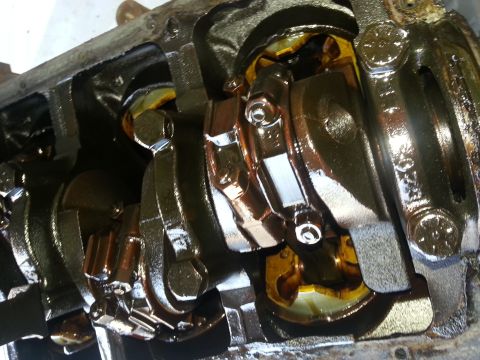 1994 Ford Bronco - Internal engine components, including the crankshaft and connecting rods, are visible in this close-up shot.