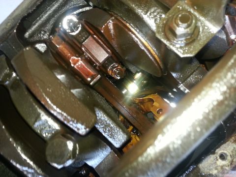 1994 Ford Bronco - Internal engine components, including the crankshaft and connecting rod, are visible in this close-up view.