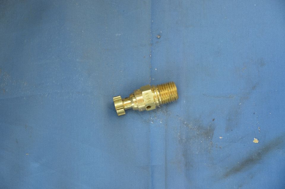Brass valve fitting with threaded end and knurled adjustment knob. Part number 1691 visible