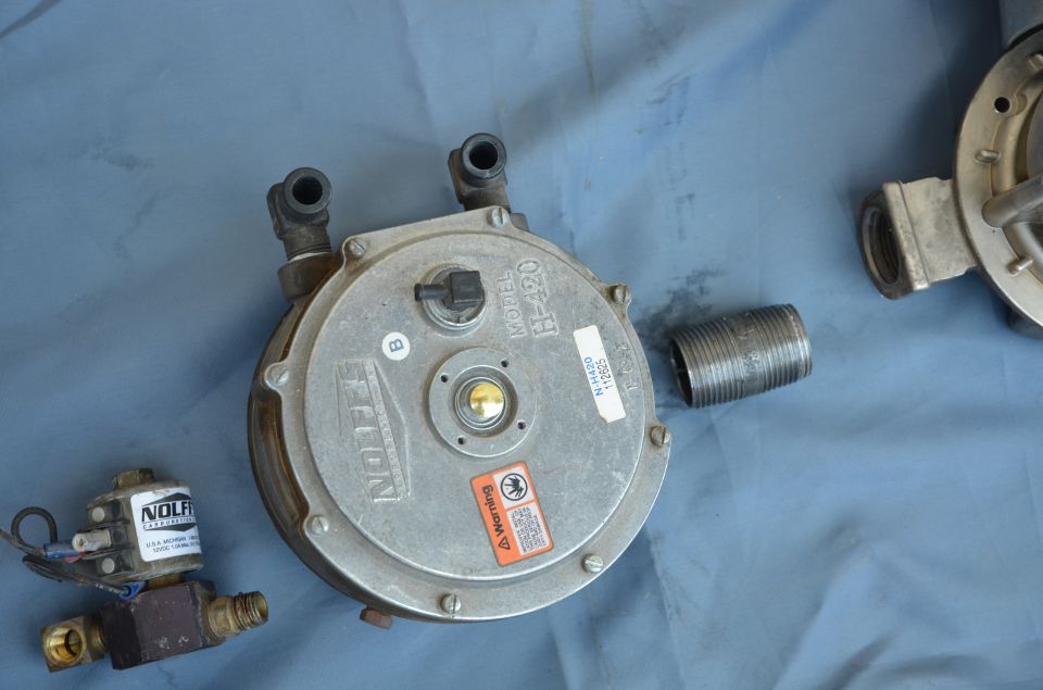 propane regulator labeled H-420 and a solenoid valve