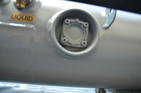 1979 Ford Bronco - Close-up of a fitting on a propane tank, labeled 'LIQUID'.