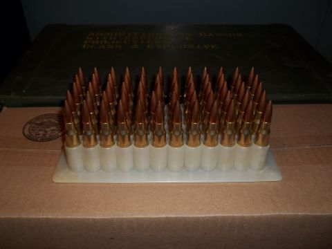 1972 Ford Ranchero - A tray of rifle cartridges sits in front of a green ammunition can, with a Supermotors.net watermark visible.