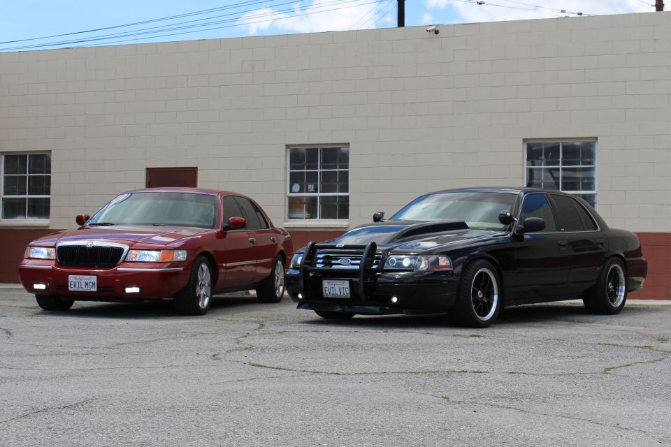 Maroon Mercury EVIL MOM and lowered black Ford with grille guard