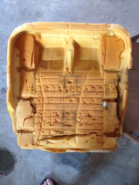 1995 Ford Bronco - View from the bottom. As you can see, its pretty bad. Every time I looked under the seat, there is a small pile of foam on the carpet, it's…