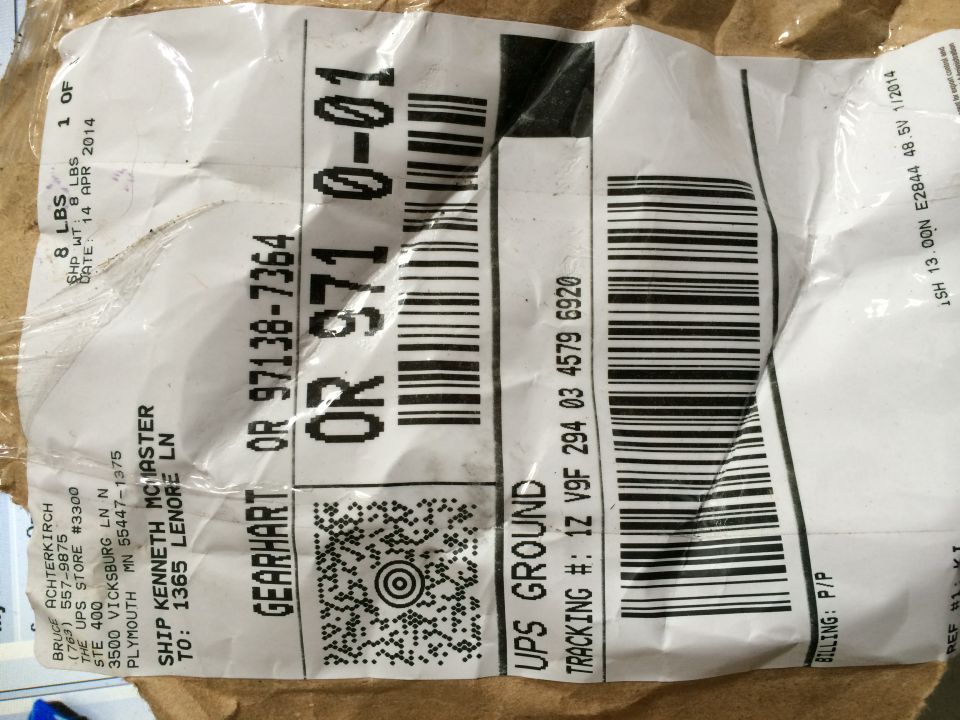 Shipping label with barcodes and addresses