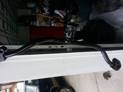 1994 Ford Bronco - A black anti-roll bar is shown, possibly for a vehicle restoration project.