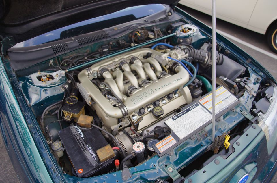 Green 1995 Ford Taurus SHO engine bay with V6 DOHC engine