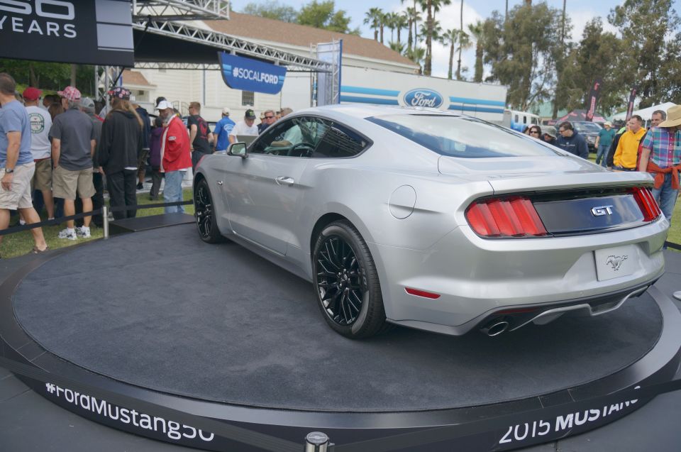Silver 2015 Ford Mustang GT rear view with GT badge
