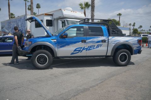 1995 Ford Taurus - Modified Ford F-150 SVT Raptor with Shelby branding and aftermarket roof rack.