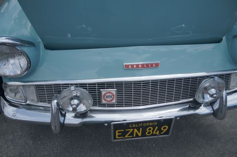 1995 Ford Taurus - Front view of a light blue car an 'Anglia' badge and a '105E' emblem on the grille.