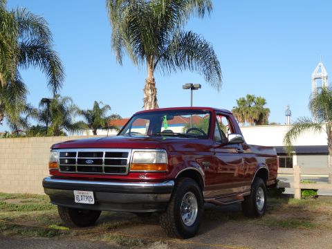 1994 Ford Bronco - This 1994 Ford Bronco is shown in a 3q-front view under a clear blue sky.