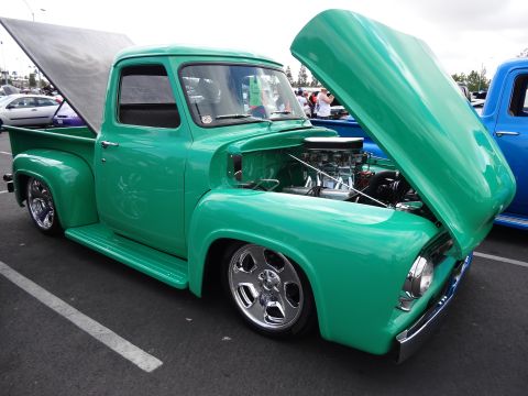 1994 Ford Bronco - Custom 1956 Ford F-100 pickup truck with a V8 engine and chrome wheels.