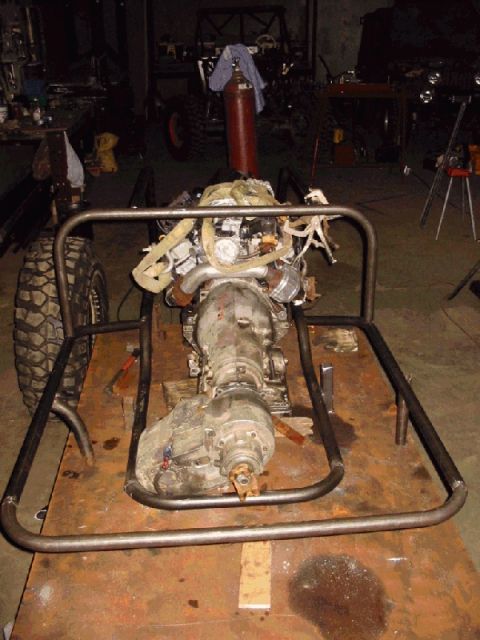 1994 Ford Bronco - Engine and transmission assembly being prepared for installation in a custom vehicle build.