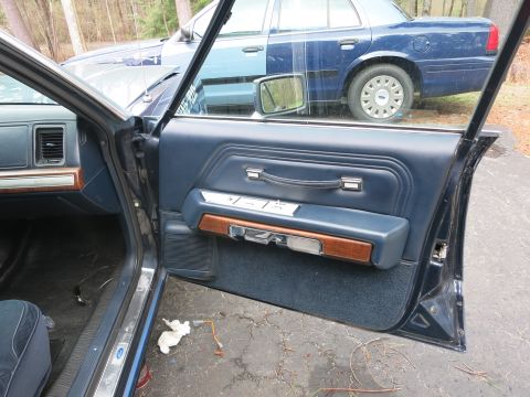 1991 Ford LTD Crown Victoria - Interior view of a 1990 Ford Crown Victoria LTD, with another blue sedan visible in the background.