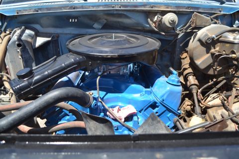 1981 Ford F-250 - Close-up view of a vehicle's engine bay, showing the engine and various components.