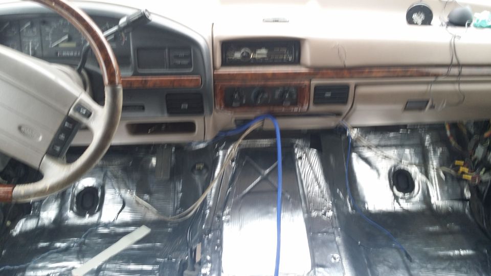 Interior of 1994 Ford Bronco with soundproofing material on the floor