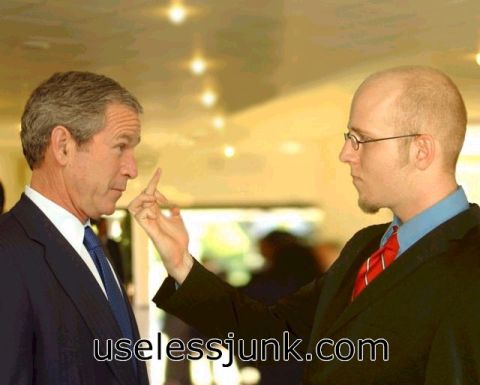1992 Ford Bronco - Two men in suits interact, one pointing a finger at the other.