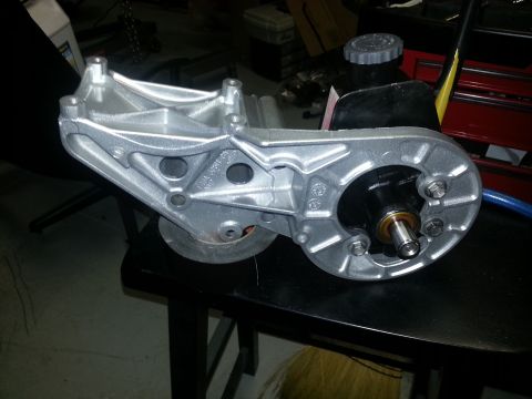 1994 Ford Bronco - Aluminum power steering pump bracket with a bearing assembly.