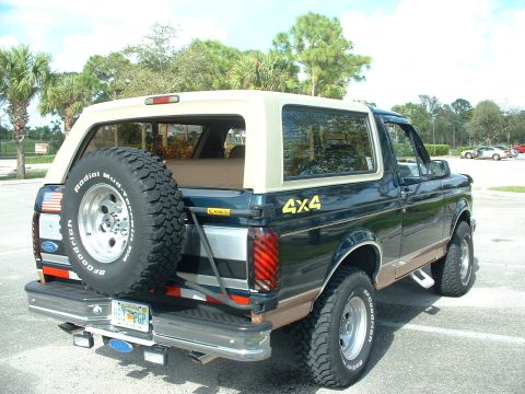 1994 Ford Bronco - This 1994 Ford Bronco is shown from the rear, its spare tire and 4x4 badging.