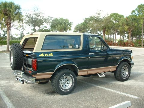 1994 Ford Bronco - 1994 Ford Bronco with 4x4 badging on the rear quarter panel.