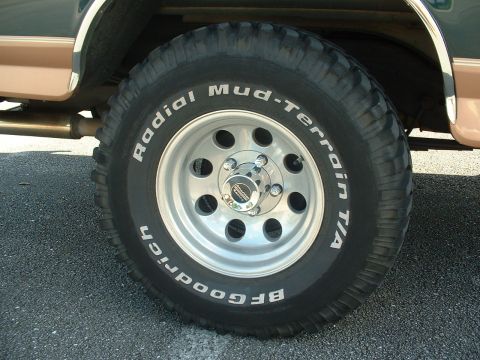 1994 Ford Bronco - Close-up of a BFGoodrich Radial Mud-Terrain T/A tire on a two-tone SUV.