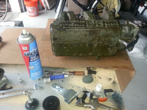 1994 Ford Bronco - A green engine block with "302" visible is on a table with tools and paint remover.