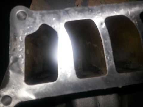 1994 Ford Bronco - This image shows a close-up view of an intake manifold, a critical engine component.