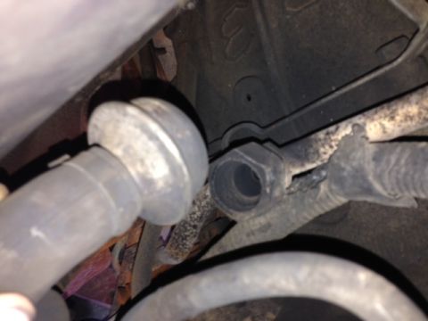 1996 Ford Bronco - A close-up view of a rubber boot on a vehicle's suspension system.