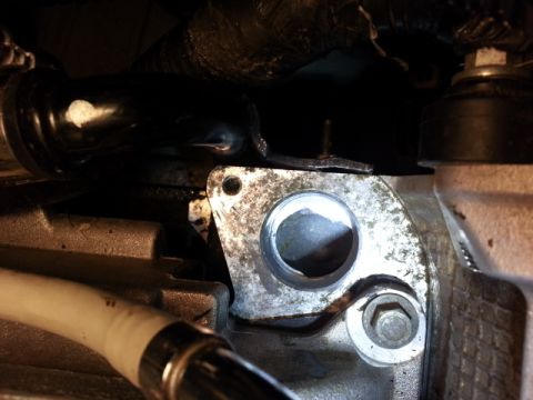 2004 Mercury Grand Marquis - Close-up of an engine component with visible text from Supermotors.net.