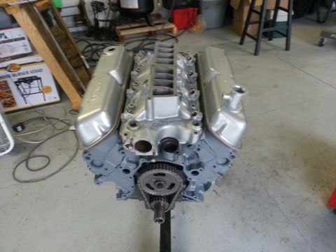 1994 Ford Bronco - Engine assembly shown from the front, with valve covers and intake manifold.