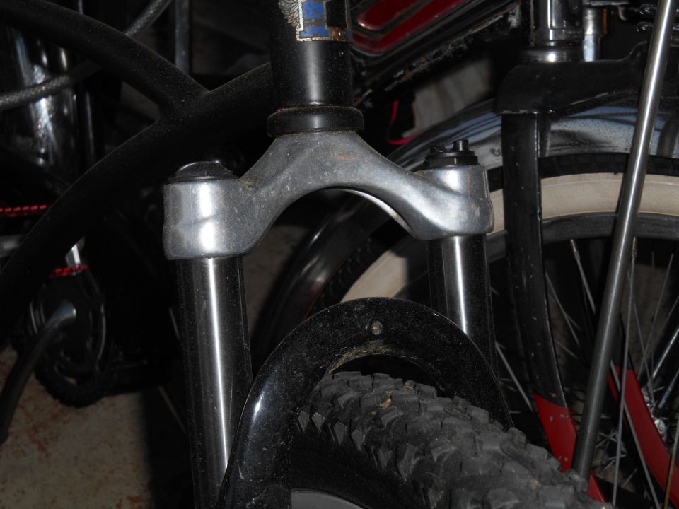 Bicycle front fork and knobby tire with black fender