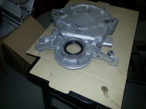 1994 Ford Bronco - This is a vehicle part, specifically an engine timing cover, not a 1994 Ford Bronco.