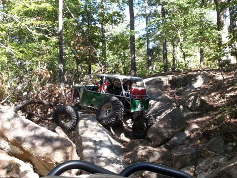 1967 Ford Mustang - This custom buggy is designed for extreme off-road terrain, tackling rocks and uneven surfaces.