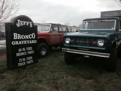 1995 Ford Bronco - Two Ford Broncos are parked outside Jeff's Bronco Graveyard, which sells parts for 66-96 Ford Broncos and 73-96 Ford trucks.