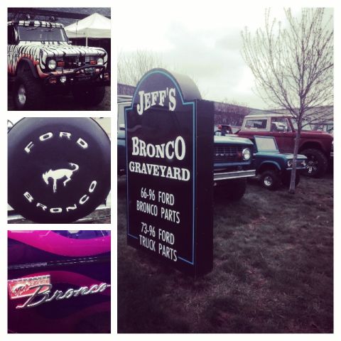 1995 Ford Bronco - A collection of Ford Broncos are seen at a parts yard, with a sign detailing available components for various model years.
