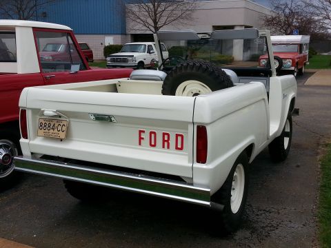 1995 Ford Bronco - First-generation Ford Bronco, likely from the 1966-1977 model years, seen in a parking lot.