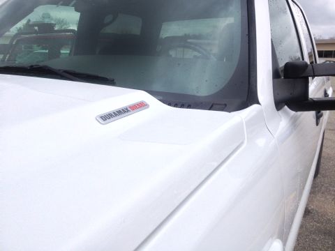2006 Chevrolet Silverado 2500 - Front view of a white 2006 Chevrolet Silverado 2500 showing the Duramax Diesel hood badge.