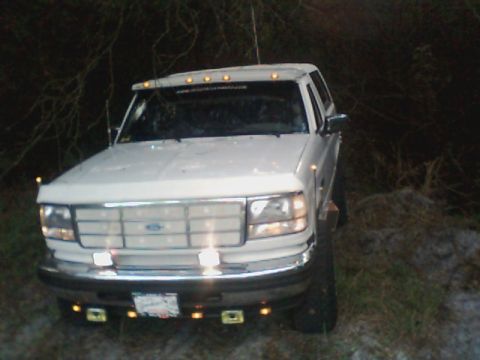 1995 Ford Bronco - This 1995 Ford Bronco is seen from a three-quarter front view, equipped with several aftermarket lights.