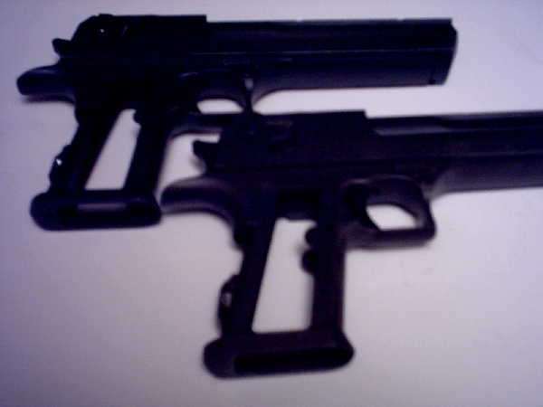 Two black handguns side-by-side