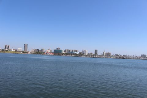 2002 Mercury Grand Marquis - View of a city skyline across the water, with a watermark indicating the source as SUPERMOTORS.